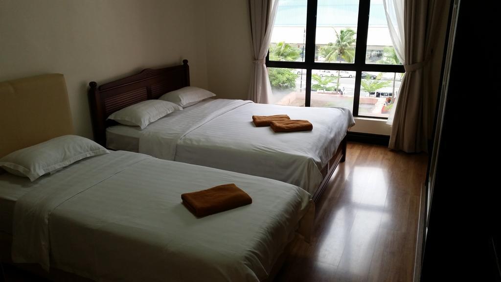 Marina Court Kota Kinabalu- Bigger Group Stay Together- 6 Bedroom Apartments Værelse billede